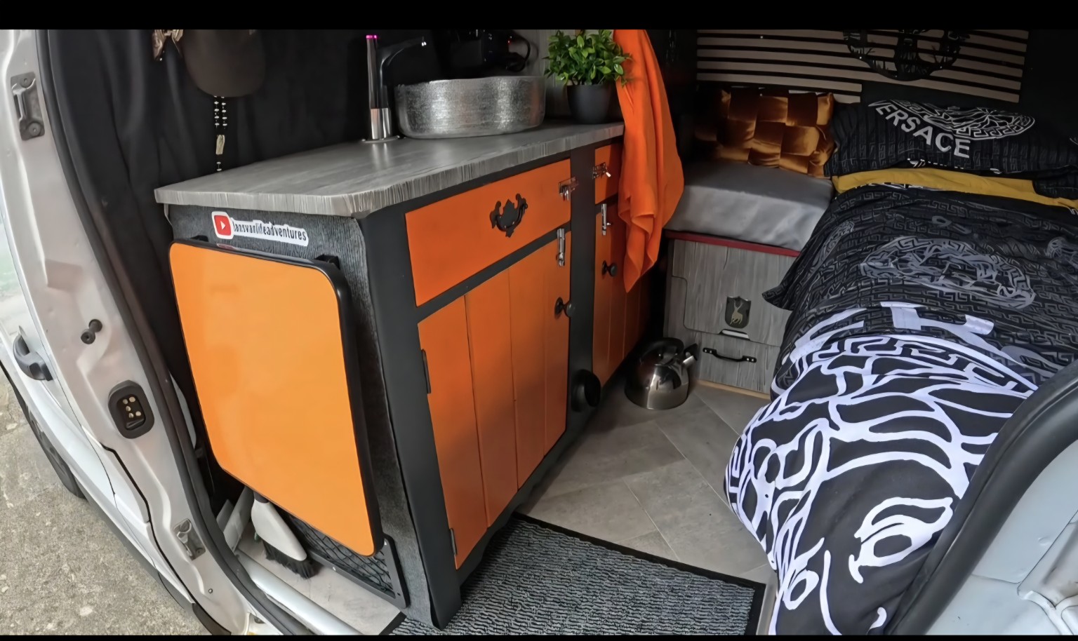 Real campervan kitchen and storage area