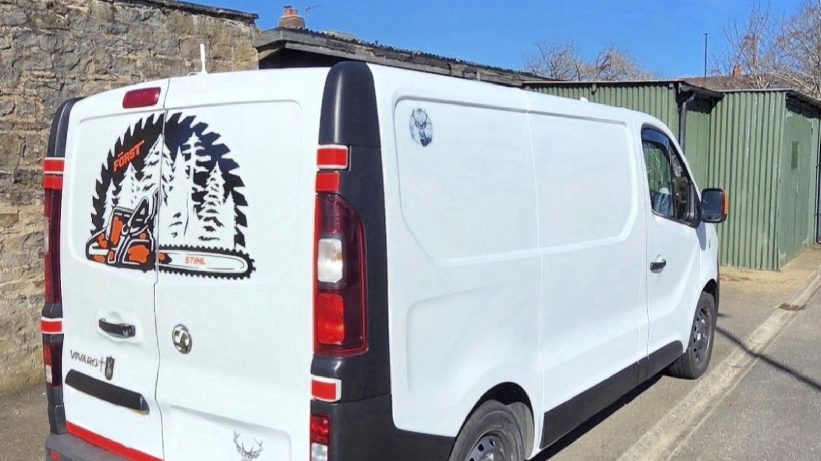 Ian's white campervan, photographed outside in the UK