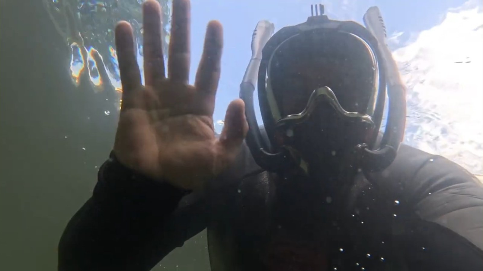 Underwater view from a mountain lake adventure